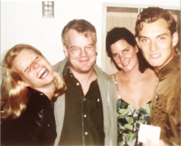Hoffman, Paltrow, Law and friend, hanging out.