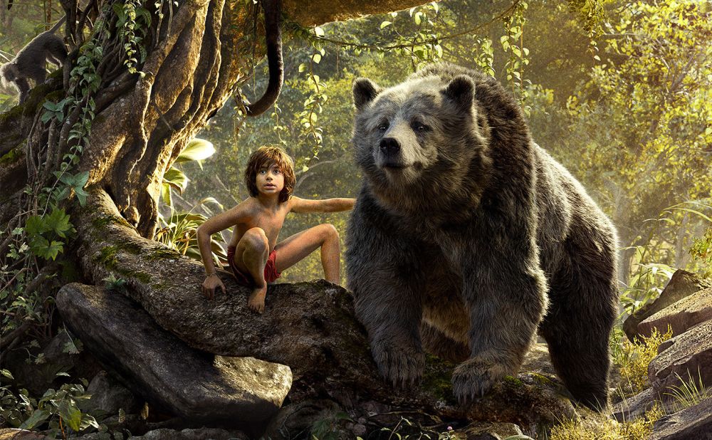 Neel Sethi as Mowgli and Bill Murray as Baloo.