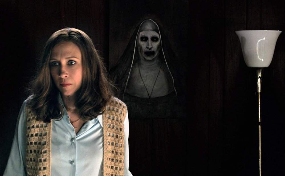Vera Farmiga as Lorraine Warren.