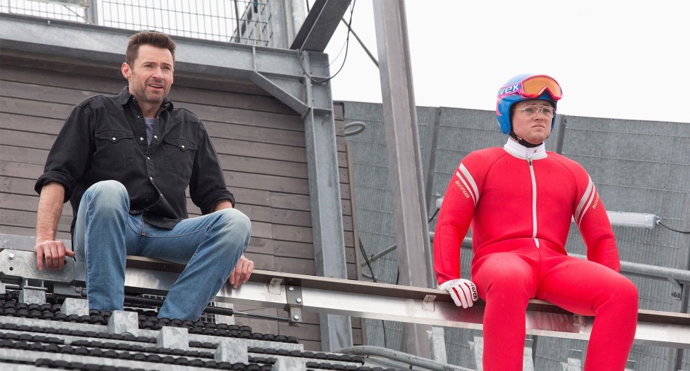 Hugh Jackman as Bronson Peary and Taron Egerton as Eddie "The Eagle" Edwards.